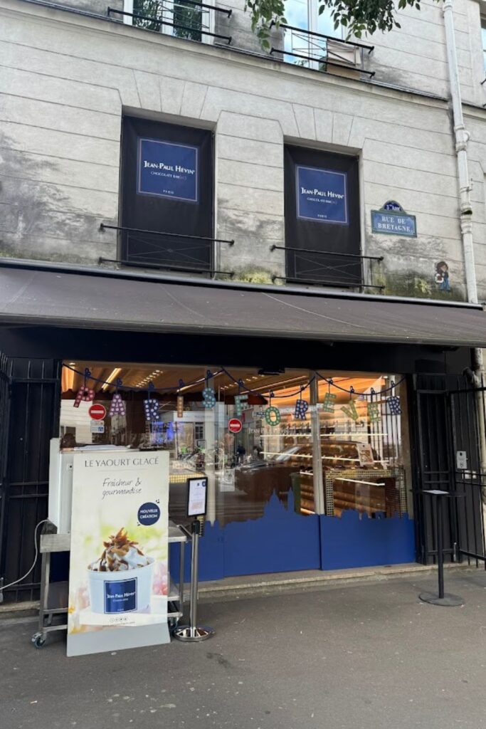 The storefront of Jean-Paul Hévin on Rue de Bretagne in Paris, a renowned chocolatier celebrated for offering some of the best hot chocolate in Paris.