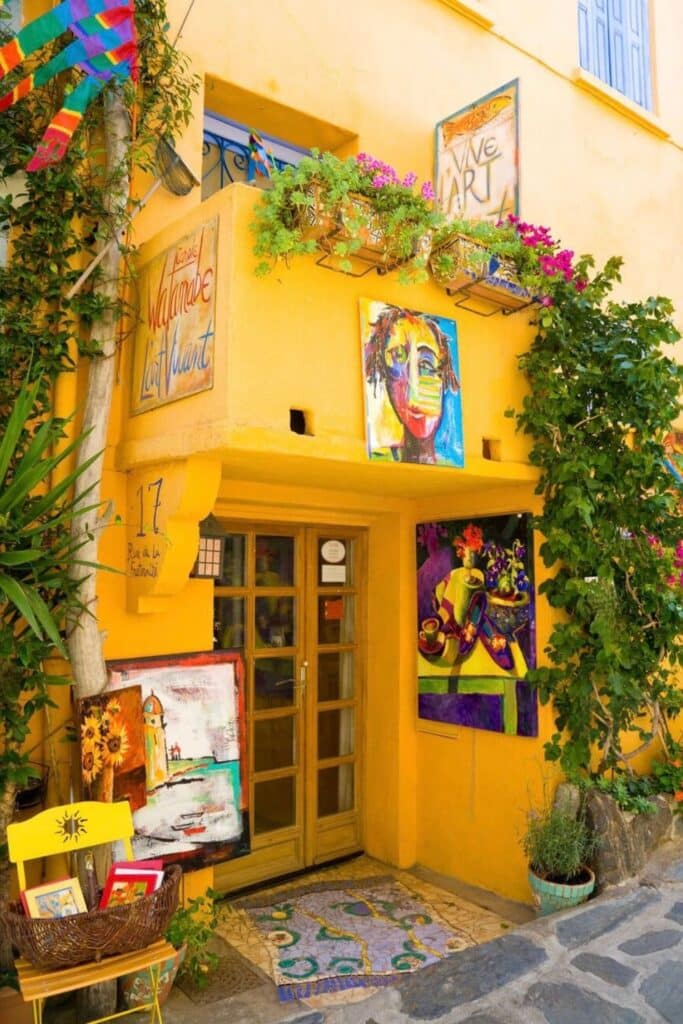 Exploring the colorful art galleries and vibrant streets of Collioure, a town that has inspired famous painters, is one of the most creative things to do in Occitanie France.