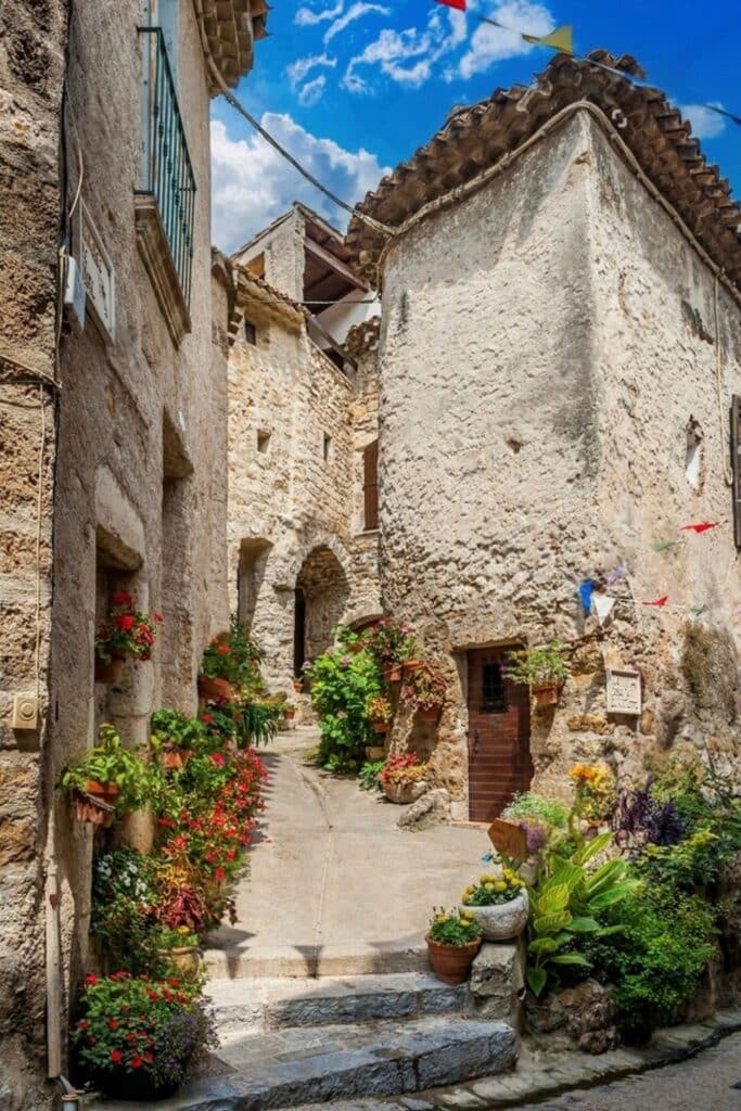 Wandering through the charming medieval streets of a stone village adorned with colorful flowers is one of the most picturesque things to do in Occitanie France.