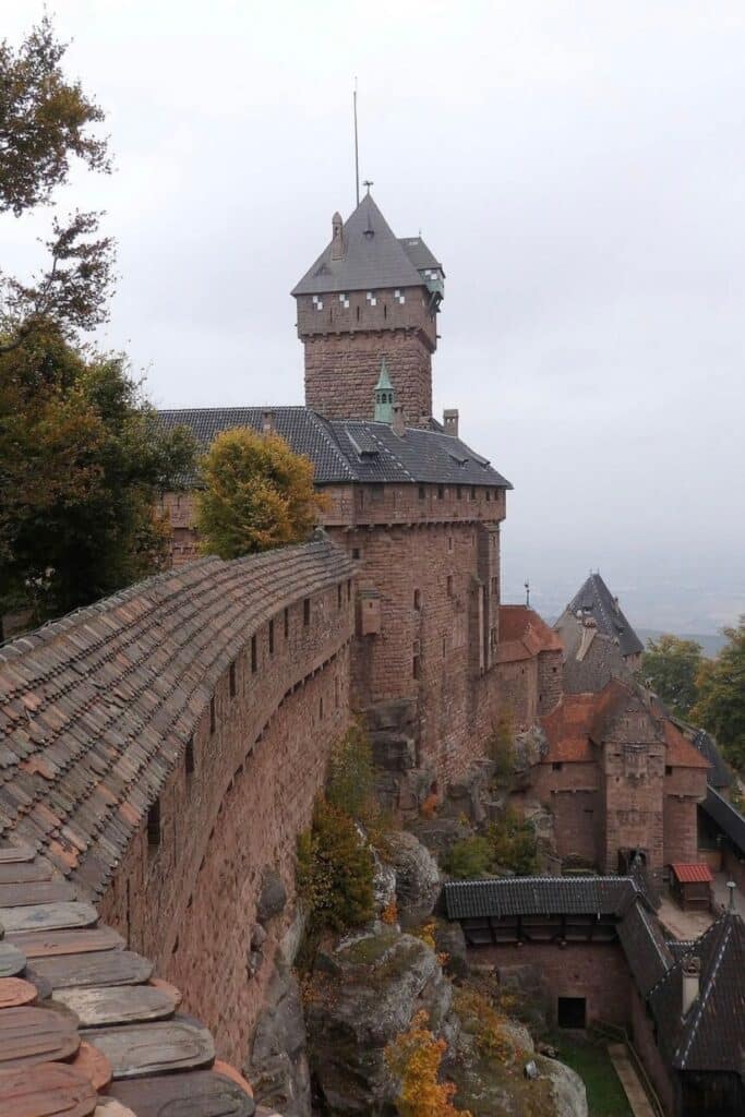Panoramic view of the majestic Château du Haut-Koenigsbourg, one of the most iconic places to visit in Alsace, with its medieval towers and stunning architecture.