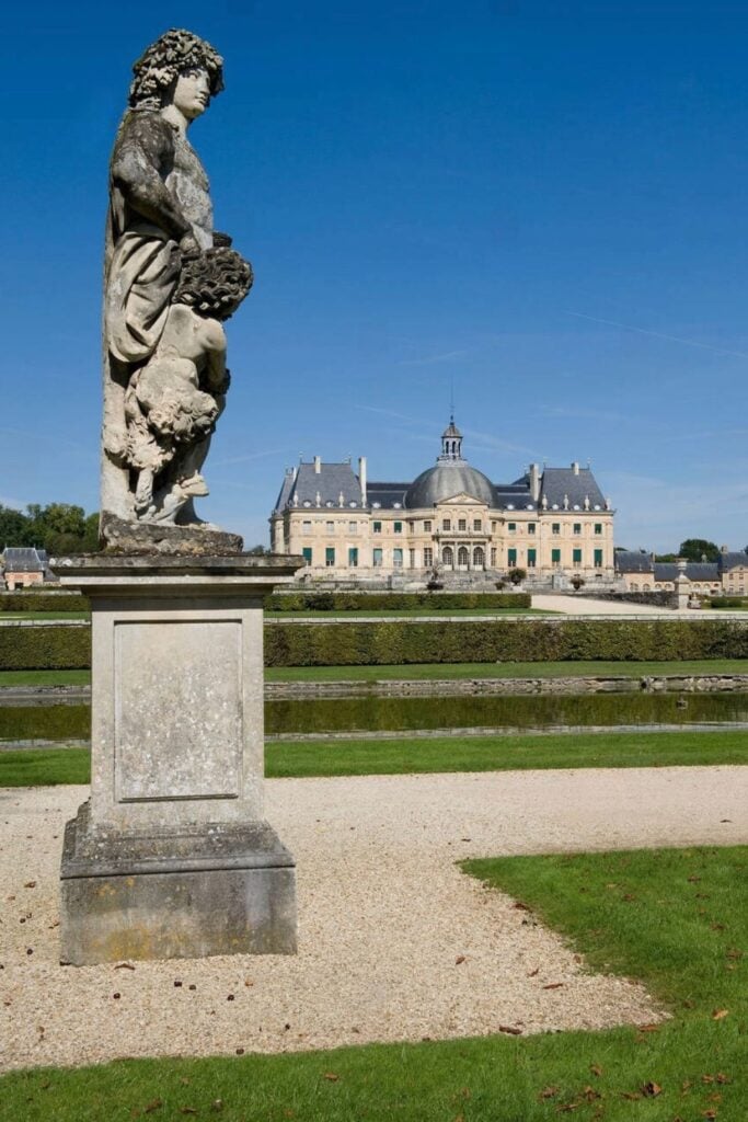 The elegant Château de Vaux-le-Vicomte, with its manicured gardens and classical sculptures, is a hidden gem for history lovers on day trips from Paris France.