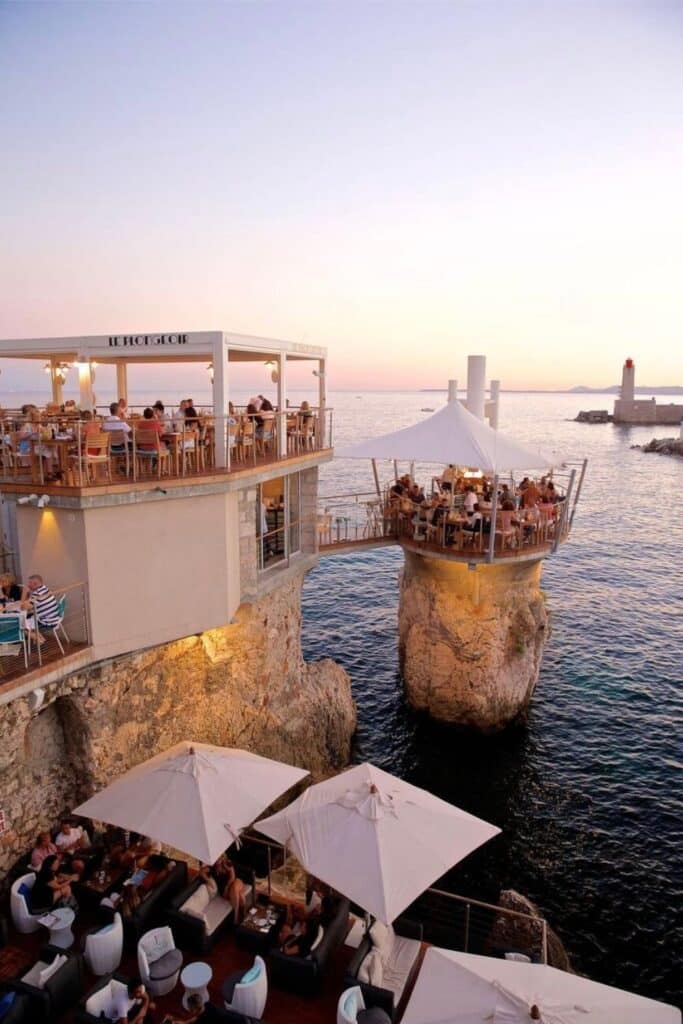 Perched on coastal rocks above the Mediterranean, Le Plongeoir restaurant in Nice offers a unique dining experience with stunning sea views at sunset—one of the most unforgettable things to do in Nice for food lovers and romantics alike.